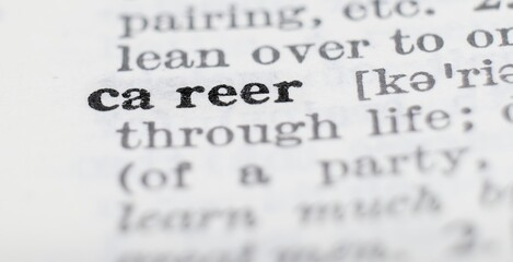 Career definition in the dictionary close-up, shallow depth of field and selective focus.