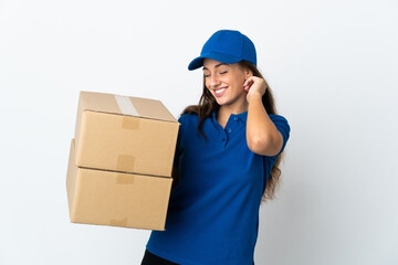 Young delivery woman over isolated white background laughing