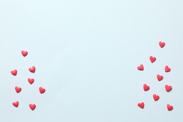 Red hearts on a colored background
