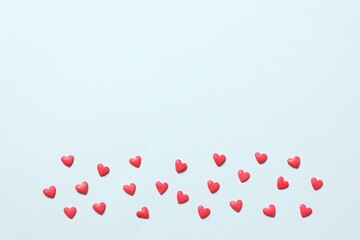 Red hearts on a colored background
