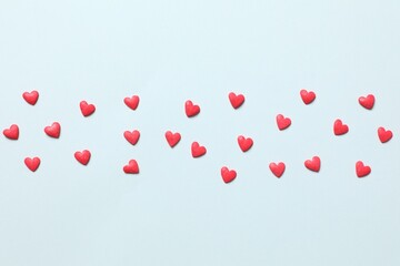 Red hearts on a colored background
