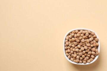 Raw chickpeas on colored background. Healthy and natural vegetarian food