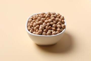 Raw chickpeas on colored background. Healthy and natural vegetarian food