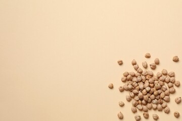 Raw chickpeas on colored background. Healthy and natural vegetarian food