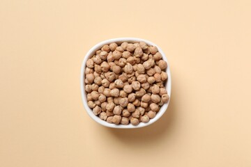 Raw chickpeas on colored background. Healthy and natural vegetarian food