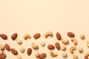 Mixed nuts on colored background