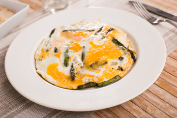 Scrambled eggs with asparagus for breakfast