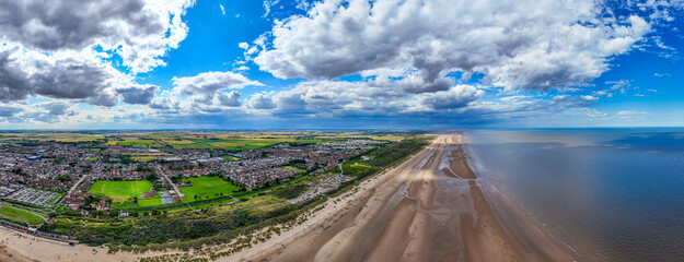 Sunset Aerial Panoramic View of the UK Seaside Town of Mablethorpe in Lincolnshire, a busy tourist...