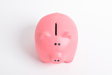 Pink piggy bank isolated on white background. Cash savings. Finance and Investment concept