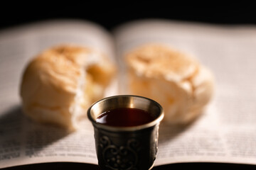 Communion, Christians celebrate their faith by partaking in bread and wine, symbolizing the body...