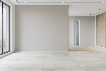 Elegant empty room interiors with a large window, neutral colors, natural lighting and copyspace. Empty property interiors.