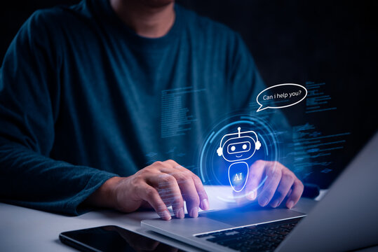 Person interacting with AI chatbot on a laptop, symbolizing advanced digital assistance and customer support. Perfect for technology, IT, and customer service content.