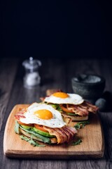 Breakfast Delight: Close-Up 4K Image of a Fried Soda Bread Sandwich with Fresh Bacon, Egg, Avocado, and Tomato
