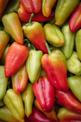 Closeup image of colorful bell peppers, ideal for cooking and adding visual appeal to dishes background