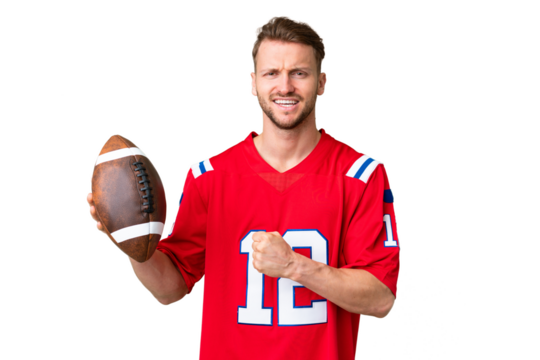 Young caucasian man playing rugby over isolated chroma key background celebrating a victory