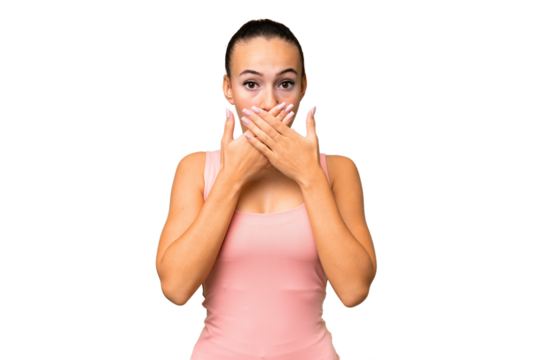 Young Arab woman over isolated background covering mouth with hands