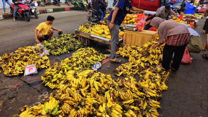 Banana selling at the wet market in Bogor city, west Java in Asia street market fruit vendor,...