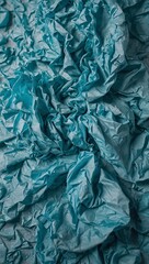 Scrunched cyan paper background