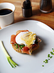 Poached egg on Parma ham and bun with Hollander sauce