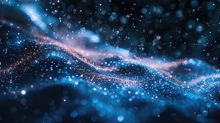 Fototapeta premium Glittering particles flowing in a dark space