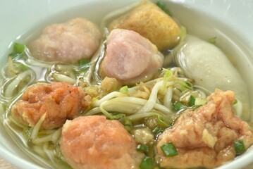 boiled Hakka meatball made from chop pork stuffing fried tofu with bean sprout and lettuce in soup on bowl