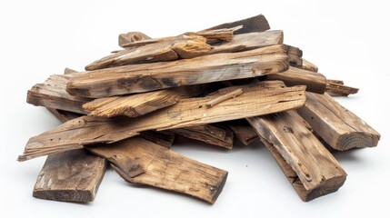A wooden pile sits atop a white surface, waiting for use