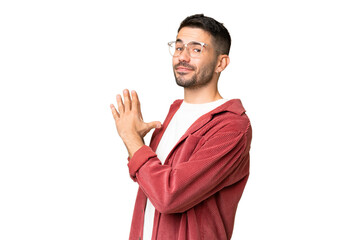 Young handsome caucasian man over isolated chroma key background scheming something