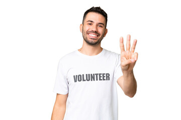 Young volunteer caucasian man over isolated chroma key background happy and counting three with fingers