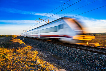 High Speed Train Passing Through Countryside in Sevilla