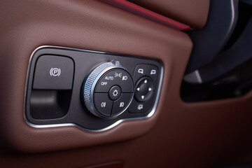Fototapeta premium A detailed view of the advanced climate control system on a modern vehicles dashboard interior