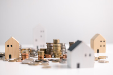Investment in a home often involves securing a mortgage loan, with a finance agent helping to manage business and property aspects of the house to ensure best use of your money. investment, loan.
