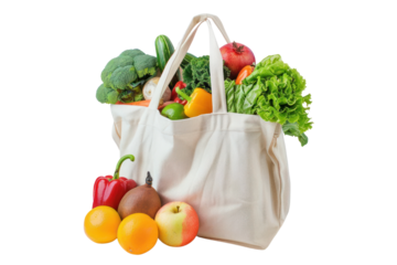 Reusable grocery bag containing fresh fruits and vegetables isolated on white background.