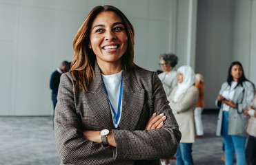 Confident woman leader at business conference in office environment