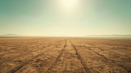 A dusty, dry landscape with no signs of water, offering ample room for copy