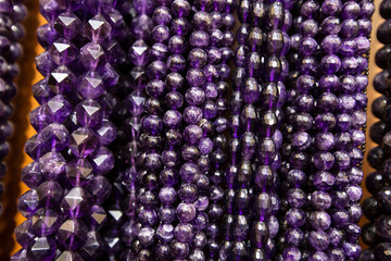 amethyst stone necklaces. amethyst stones strung on a string