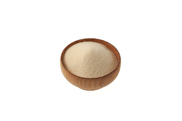 Organic Semolina powder in wooden bowl on white background. Design element