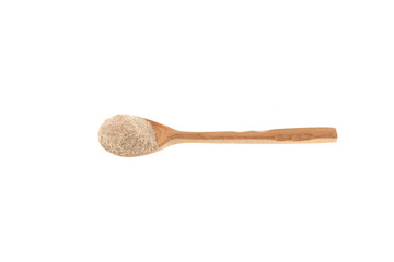 Psyllium (Ispaghula) Husk. Psyllium coarse flour on wooden spoon. Medicinal organic isabgol husk (Plantago ovata)