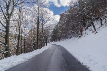 Mountain road in winter, Tanaro valley, Piedmont, Ligurian Alps, Italy