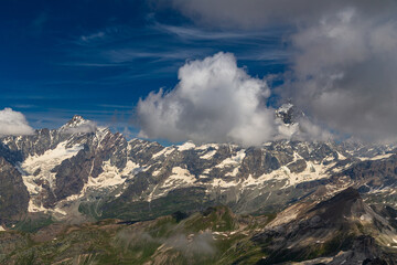 Summer trekking day in the mountains over Valtournanche