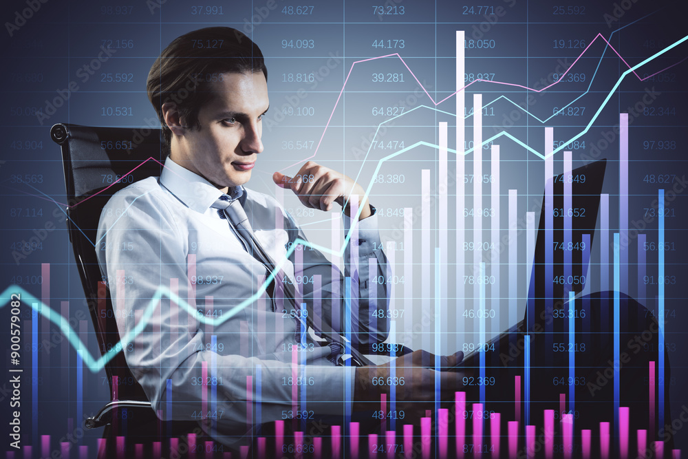 Canvas Prints businessman analyzing financial data on laptop with graph overlays.