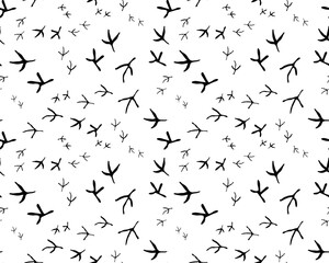 Iillustration of black traces of birds, seamless wallpaper	