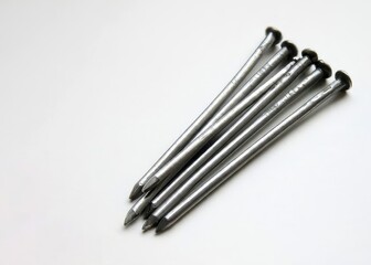 Metal nails on white background