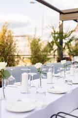Beautiful table set for an event party or wedding reception . restaurant interior