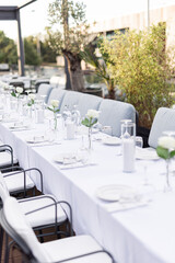 Beautiful table set for an event party or wedding reception . restaurant interior