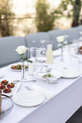 Beautiful table set for an event party or wedding reception . restaurant interior