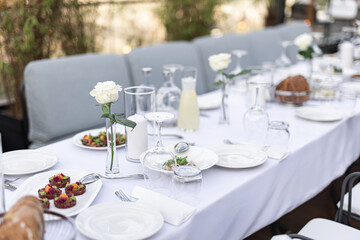 Beautiful table set for an event party or wedding reception . restaurant interior