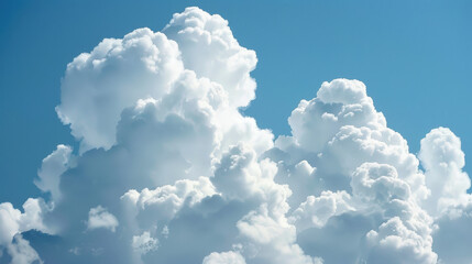 Naklejka premium Fluffy White Clouds Against a Clear Blue Sky Background