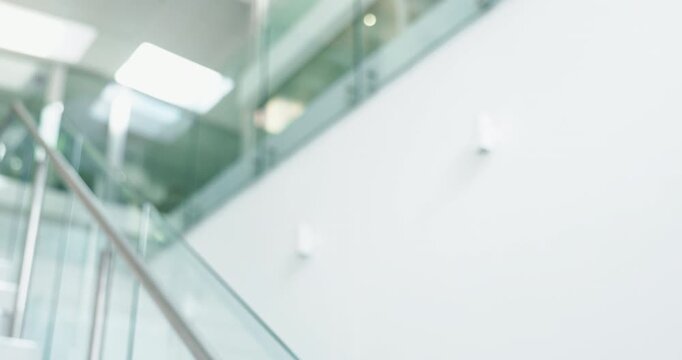 Office, fall and businessman on stairs with phone for accident, mistake and injury from walking. Corporate, workplace safety and worker slip, lose balance and stumble with smartphone for multitasking