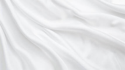 Fototapeta premium Close-up of elegant white satin fabric featuring soft folds and a smooth texture, perfect for backgrounds, fashion, and textiles. 