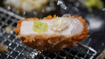 fried pork with vegetables and wasabi